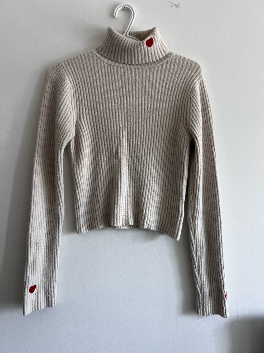 Cream Ribbed Turtleneck Sweater with Red Accent
